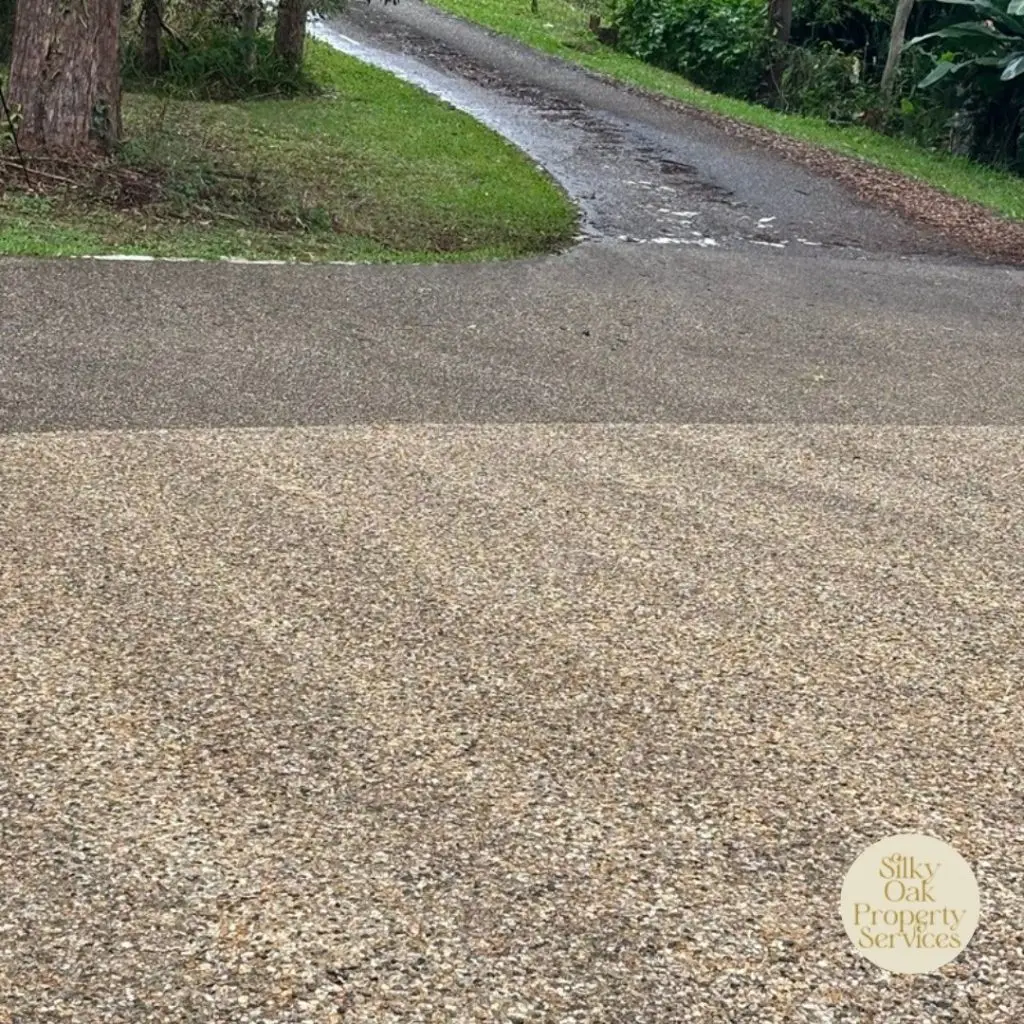 Before and after pressure washing of an exposed aggregate driveway on a commercial property in North Brisbane